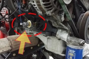 Engine knock sensor shown in a car